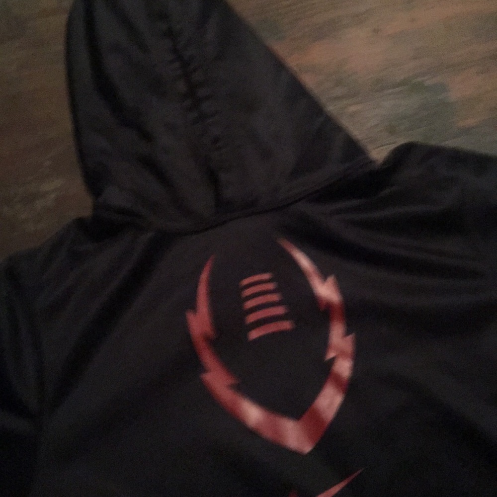 A Nike football hoodie (black and red)